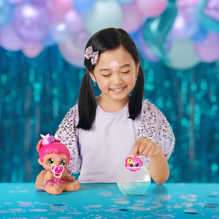 Kindi Kids 50241 Dress Baby Sister Tulla Tropics Mermaid with face Paint Reveal, 1 Doll with Toy Pacifier and Magic Sponge, Big Glittery Eyes, Squishy Arms and Legs, Removeable Diaper - Image 2