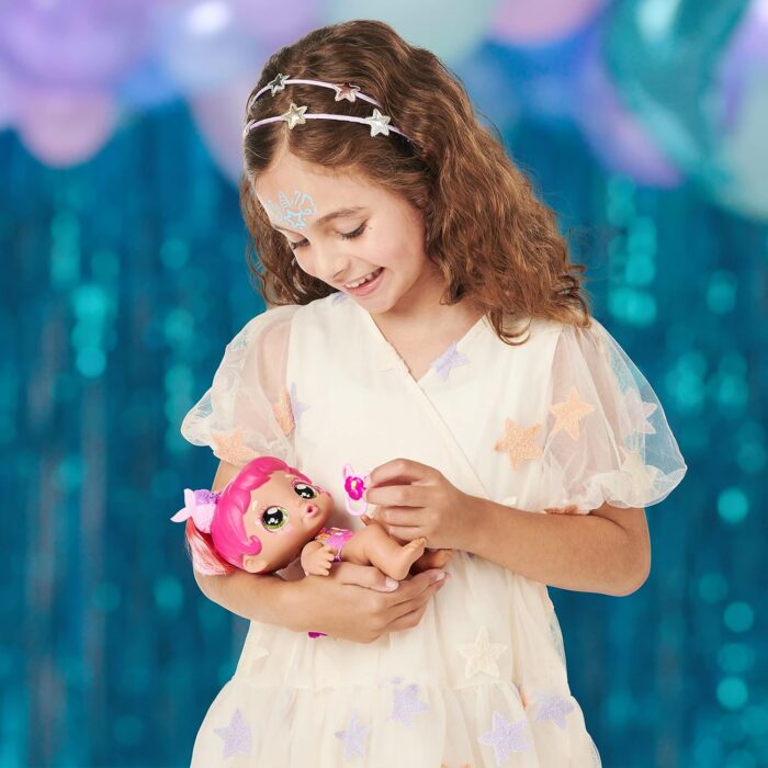 Kindi Kids 50241 Dress Baby Sister Tulla Tropics Mermaid with face Paint Reveal, 1 Doll with Toy Pacifier and Magic Sponge, Big Glittery Eyes, Squishy Arms and Legs, Removeable Diaper - Image 3